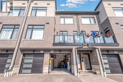 407 - 2550 Castlegate Crossing, Pickering, ON - Outdoor With Balcony With Facade