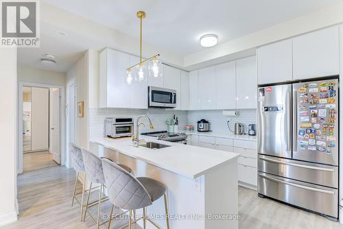 407 - 2550 Castlegate Crossing, Pickering, ON - Indoor Photo Showing Kitchen With Upgraded Kitchen