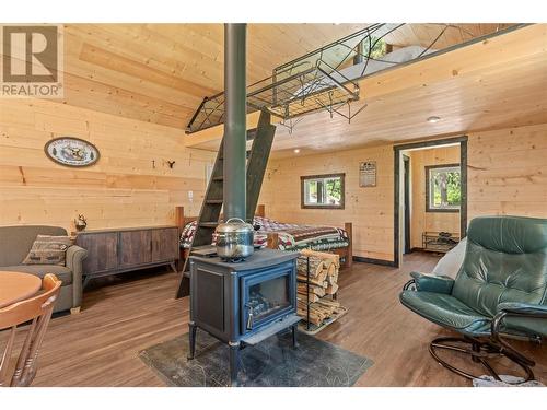 5950 Crouse Creek Forest, Westbridge, BC - Indoor With Fireplace