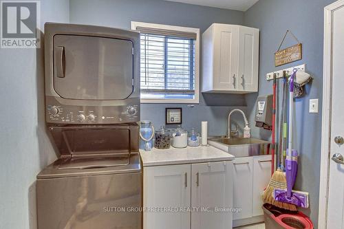 Main floor laundry - 1302 Blackmaple Drive, London, ON - Indoor Photo Showing Laundry Room