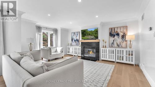 24 - 1500 Richmond Street, London, ON - Indoor Photo Showing Living Room With Fireplace