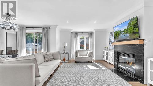 24 - 1500 Richmond Street, London, ON - Indoor Photo Showing Living Room With Fireplace