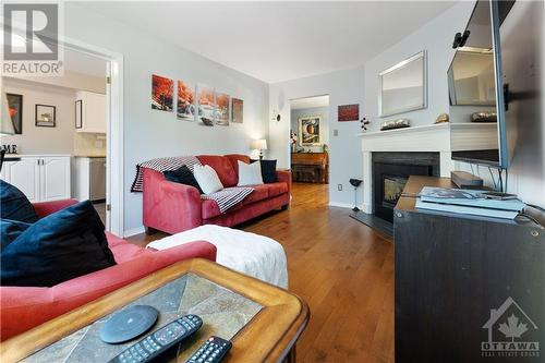 98 Waterton Crescent, Ottawa, ON - Indoor Photo Showing Living Room With Fireplace