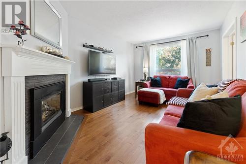 98 Waterton Crescent, Ottawa, ON - Indoor Photo Showing Living Room With Fireplace