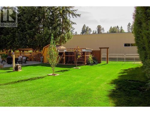 795 Smith  Crescent, Genelle, BC - Outdoor With Deck Patio Veranda With Backyard