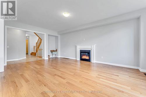 64 Mackay Drive, Woodstock, ON - Indoor Photo Showing Living Room With Fireplace