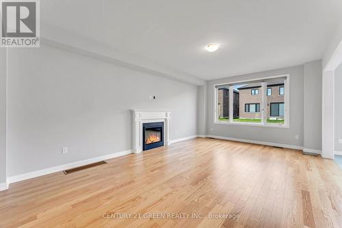 64 Mackay Drive, Woodstock, ON - Indoor Photo Showing Living Room With Fireplace