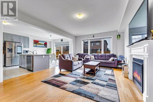 530 Thompson Street, Woodstock, ON - Indoor Photo Showing Living Room With Fireplace