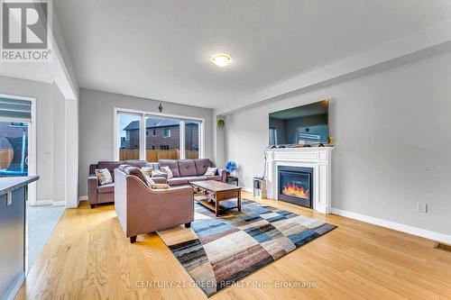 530 Thompson Street, Woodstock, ON - Indoor Photo Showing Living Room With Fireplace