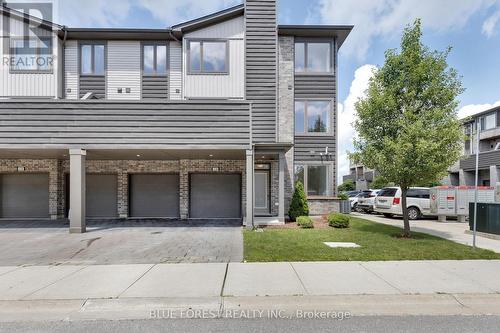 126 - 1960 Dalmagarry Road, London, ON - Outdoor With Facade