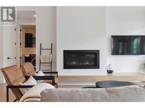 15874 Kobayashi Court, Lake Country, BC - Indoor Photo Showing Living Room With Fireplace