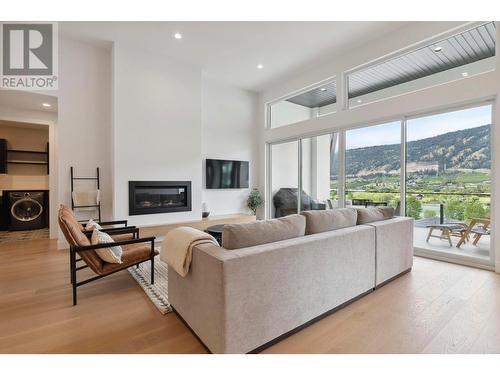 15874 Kobayashi Court, Lake Country, BC - Indoor Photo Showing Living Room With Fireplace