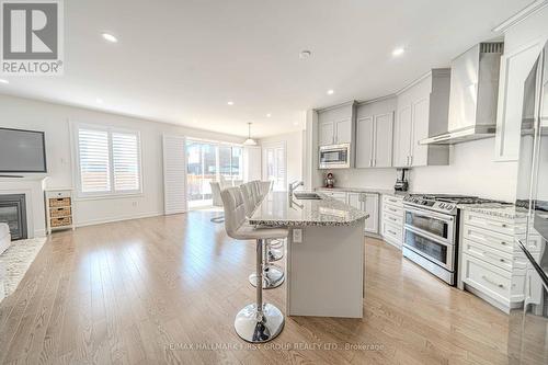 5 Toulouse Street, Whitby, ON - Indoor Photo Showing Kitchen With Fireplace With Upgraded Kitchen