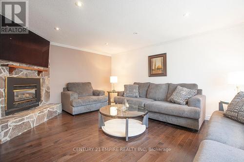 516 Woodward Avenue, Milton (Dorset Park), ON - Indoor Photo Showing Living Room With Fireplace