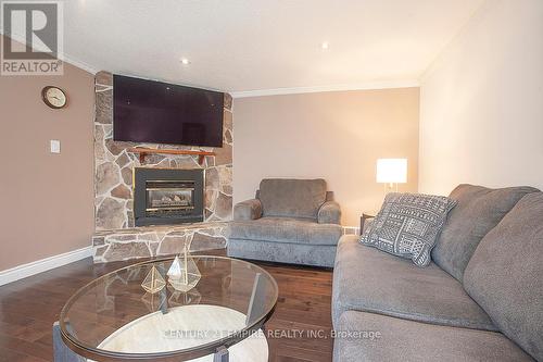 516 Woodward Avenue, Milton (Dorset Park), ON - Indoor Photo Showing Living Room With Fireplace