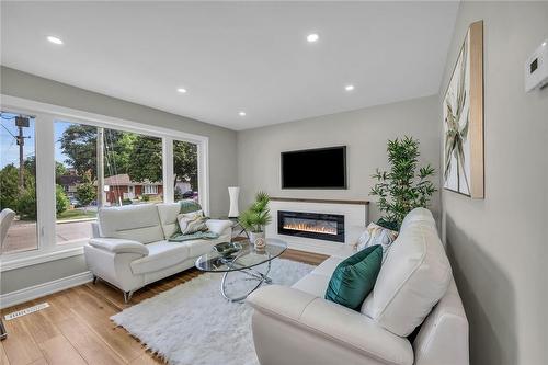 66 Howe Avenue, Hamilton, ON - Indoor Photo Showing Living Room With Fireplace