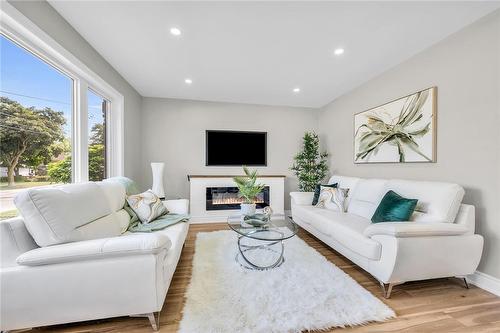 66 Howe Avenue, Hamilton, ON - Indoor Photo Showing Living Room With Fireplace