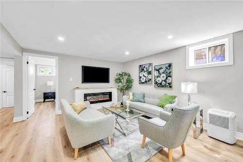 66 Howe Avenue, Hamilton, ON - Indoor Photo Showing Living Room With Fireplace