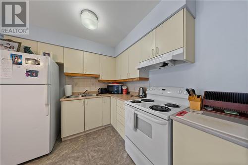 5747 Highway 69 North, Hanmer, ON - Indoor Photo Showing Kitchen With Double Sink