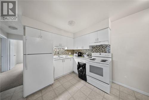 5747 Highway 69 North, Hanmer, ON - Indoor Photo Showing Kitchen With Double Sink