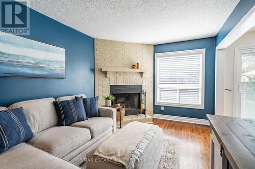 5740 Stibbard Road, Mississauga (Central Erin Mills), ON - Indoor Photo Showing Living Room With Fireplace