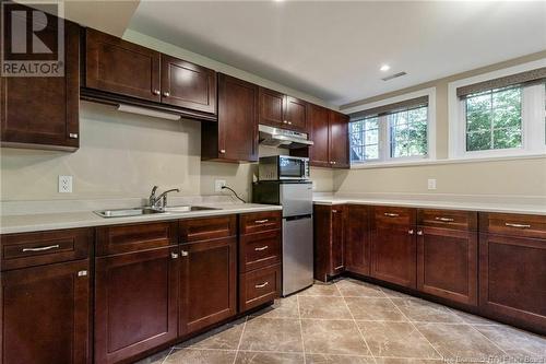 46 Chem. Les Arpents Verts, Grand-Barachois, NB - Indoor Photo Showing Kitchen With Double Sink