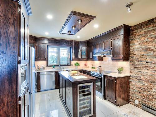 Cuisine - 1553 Boul. Jolibourg, Laval (Sainte-Dorothée), QC - Indoor Photo Showing Kitchen With Upgraded Kitchen