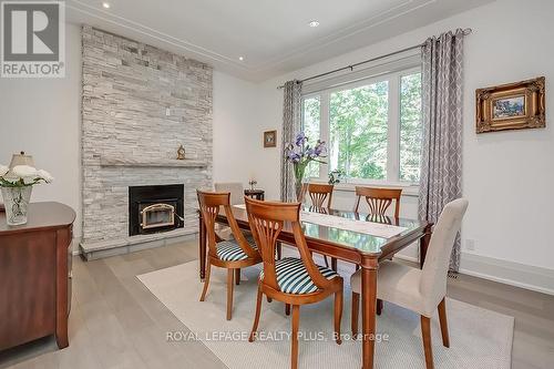 3136 Limestone Road, Milton, ON - Indoor Photo Showing Dining Room With Fireplace