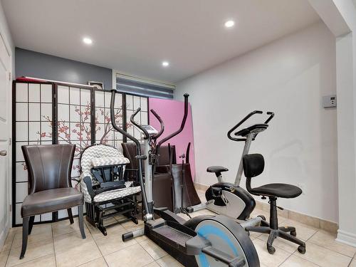 Salle familiale - 633 1Re Avenue, Laval (Fabreville), QC - Indoor Photo Showing Gym Room