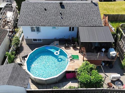 Cour - 633 1Re Avenue, Laval (Fabreville), QC - Outdoor With Above Ground Pool With Exterior