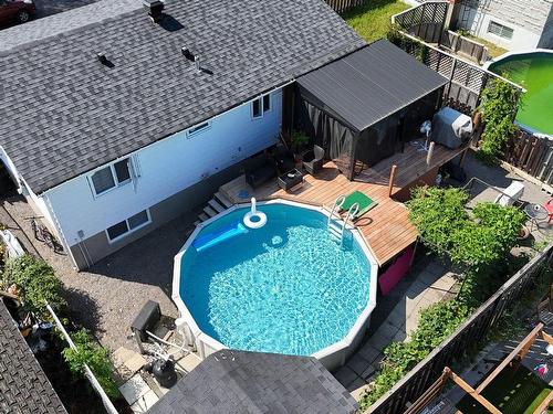 Cour - 633 1Re Avenue, Laval (Fabreville), QC - Outdoor With Above Ground Pool With Exterior