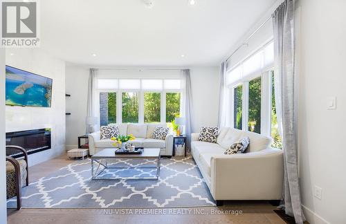 2358 Wickerson Road, London, ON - Indoor Photo Showing Living Room With Fireplace