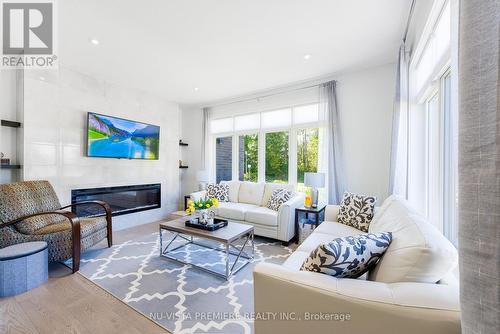 2358 Wickerson Road, London, ON - Indoor Photo Showing Living Room With Fireplace