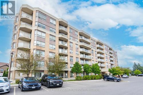 107 - 300 Ray Lawson Boulevard N, Brampton, ON - Outdoor With Balcony With Facade