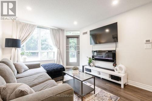 107 - 300 Ray Lawson Boulevard N, Brampton, ON - Indoor Photo Showing Living Room