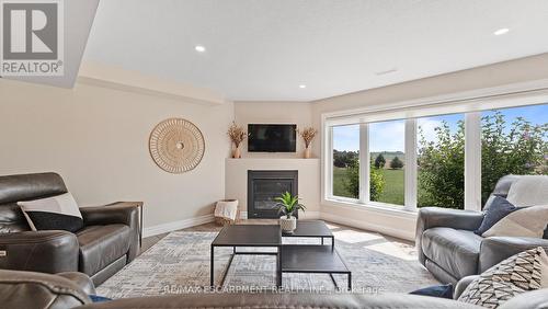 3 - 670 Bishopsgate Road, Brant (Paris), ON - Indoor Photo Showing Living Room With Fireplace