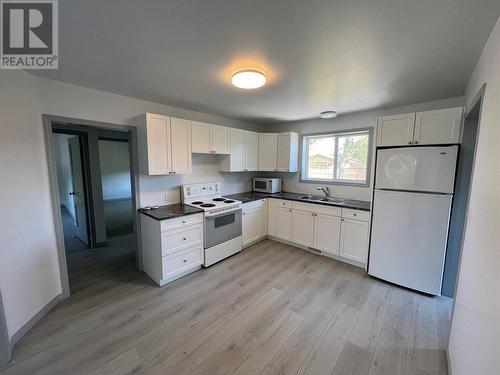 912 106 Avenue, Dawson Creek, BC - Indoor Photo Showing Kitchen With Double Sink