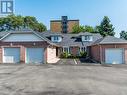 -21 - 2435 Woodward Avenue, Burlington (Brant), ON  - Outdoor With Facade 