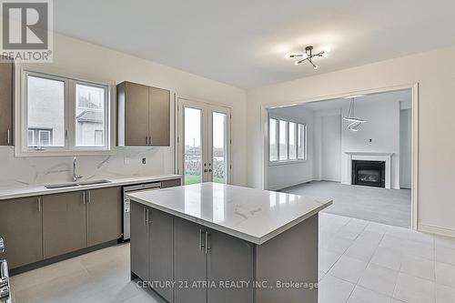 87 Current Drive, Richmond Hill, ON - Indoor Photo Showing Kitchen With Fireplace With Double Sink