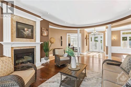 7429 Carter Road, Ottawa, ON - Indoor Photo Showing Living Room With Fireplace