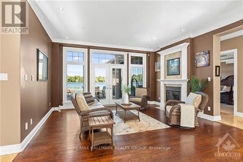 7429 Carter Road, Ottawa, ON - Indoor Photo Showing Living Room With Fireplace