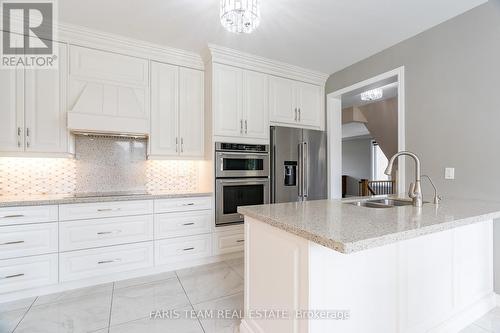 9 Roy Road, New Tecumseth (Tottenham), ON - Indoor Photo Showing Kitchen With Double Sink With Upgraded Kitchen