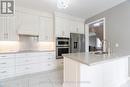 9 Roy Road, New Tecumseth (Tottenham), ON  - Indoor Photo Showing Kitchen With Double Sink With Upgraded Kitchen 