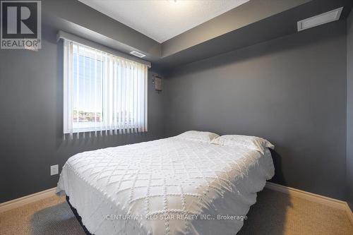 310 - 500 Mapleview Drive W, Barrie, ON - Indoor Photo Showing Bedroom