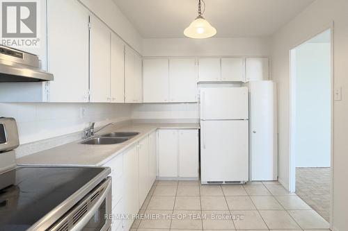 607 - 3533 Derry Road E, Mississauga (Malton), ON - Indoor Photo Showing Kitchen With Double Sink