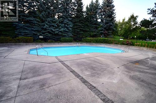 201 - 12 Laurelcrest Street, Brampton (Queen Street Corridor), ON - Outdoor With In Ground Pool With Backyard