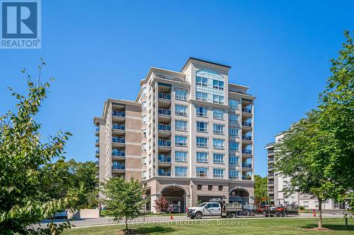 801 - 3000 Creekside Drive, Hamilton, ON - Outdoor With Balcony With Facade