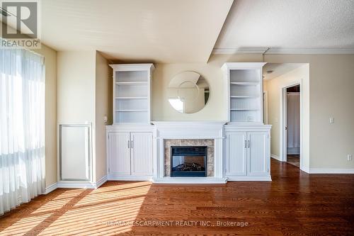 801 - 3000 Creekside Drive, Hamilton, ON - Indoor Photo Showing Living Room With Fireplace