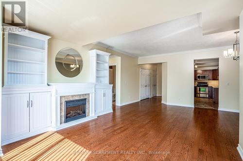 801 - 3000 Creekside Drive, Hamilton, ON - Indoor Photo Showing Living Room With Fireplace