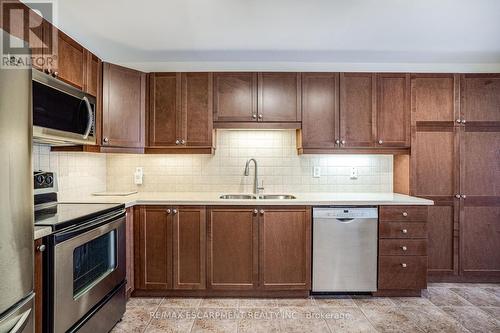 801 - 3000 Creekside Drive, Hamilton, ON - Indoor Photo Showing Kitchen With Double Sink